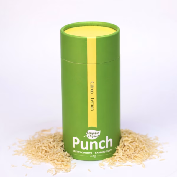 Tube de 40 g d'éclats de citron confits biologiques Punch posé sur un lit de zestes